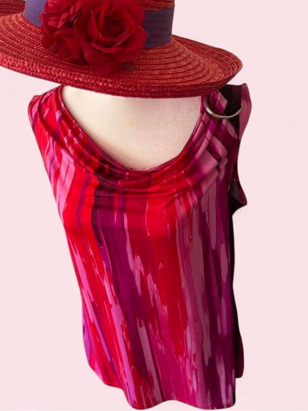 Women’s size medium sleeveless tunic by Dana Buchman. Pink/purple watercolors.